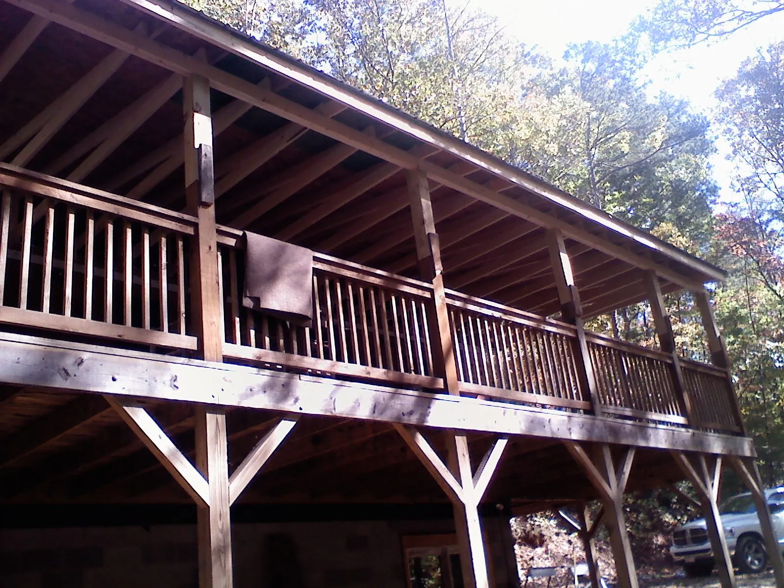 Timber framing under a new elevated porch and deck — Roof Leak Repair in Pine Plains by Roofing Brothers